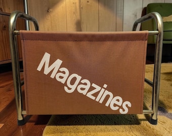 Vintage canvas and metal magazine storage rack