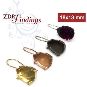 May include: Four earring settings in gold, silver, copper, and black metal. Each setting is shaped like a teardrop and measures 18x13 mm. The settings are designed to hold a teardrop-shaped stone.