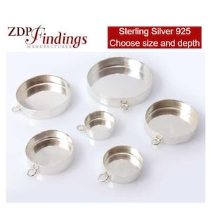 May include: An assortment of sterling silver 925 jewellery findings. The findings are circular with a small loop attached. The image text reads "Sterling Silver 925 Choose size and depth". The logo "ZDP Findings Manufacturer" is also visible.