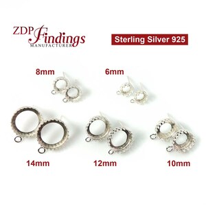 May include: Sterling silver 925 earring settings in various sizes: 6mm, 8mm, 10mm, 12mm, and 14mm. Each setting features a round bezel with a smooth, polished finish and a loop for attaching a pendant or charm.
