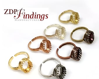 May include: Six adjustable ring settings with a crown bezel, in silver, gold, copper, and black metal.