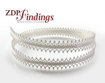 May include: Silver metal trim with a delicate heart and dot design. The trim is coiled and ready to be used for jewelry making or other craft projects.