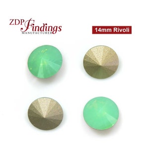 May include: Four 14mm round green and gold iridescent glass rhinestones.  The rhinestones are faceted and have a pointed back.  14mm Rivoli.