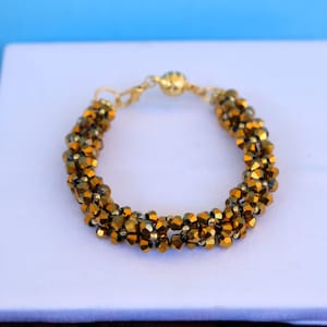 Gold Metallic Perlen Bicone Cluster Armband