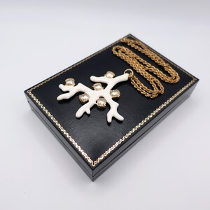 Signed KJL White Coral Pendant Necklace by Kenneth Jay Lane with Enamel on Gold Tone Metal - Statement Piece - turned to the right