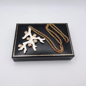 Signed KJL White Coral Pendant Necklace by Kenneth Jay Lane with Enamel on Gold Tone Metal - Statement Piece - on box with chain laid out