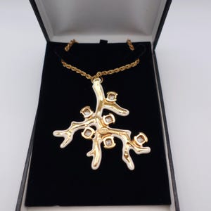 Signed KJL White Coral Pendant Necklace by Kenneth Jay Lane with Enamel on Gold Tone Metal - Statement Piece - close up of back showing maker's mark