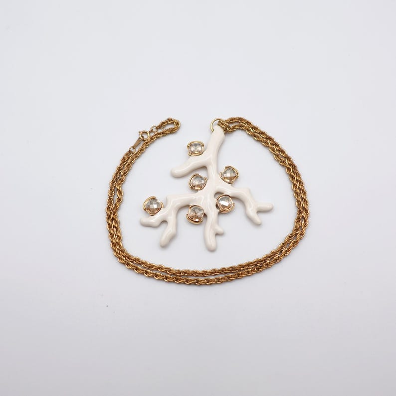 Signed KJL White Coral Pendant Necklace by Kenneth Jay Lane with Enamel on Gold Tone Metal - Statement Piece - necklace wrapped around pendant, no box
