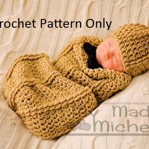 May include: A crochet pattern for a baby hat and swaddle, shown in a tan color. The pattern is called "Crochet Pattern Only".