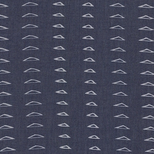 May include: A dark blue fabric with a white repeating pattern of small triangles. The triangles are evenly spaced and create a subtle geometric design.