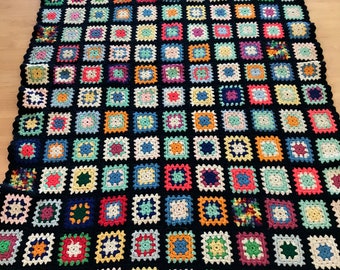 Granny Square crochet afghan, vintage throw, hand made, 48 x 75", black background, colorful yarn, country farmhouse decor, cozy blanket