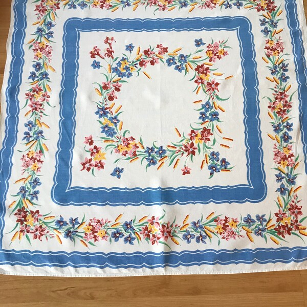 Vintage tablecloth, retro floral design, blue red yellow pink, 34" table linen, 1950s flower design, scalloped border, cottage decor