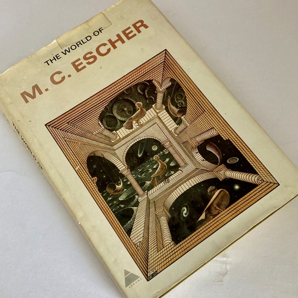 World of M C Escher by Abrams Publ 1971 edition, color b and w plates, Escher's works, science and fiction, math implications, biography