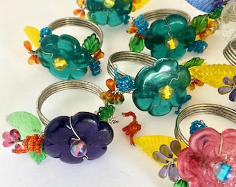 10 napkin rings, floral designs on wire rings, assortment of colors, for festive dining, fun tableware