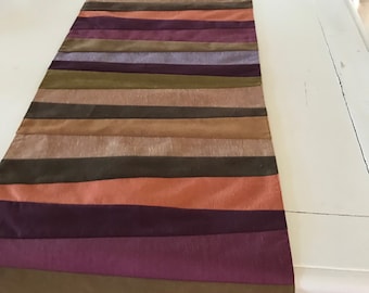 Crate and Barrel, table runner, 14 x 90 inches, patchwork design, midcentury style, purple gold orange beige, green backing, No 514-004