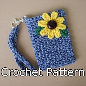 May include: Crochet pattern for a blue phone case with a yellow sunflower and green leaves. The case has a strap with a silver clasp.