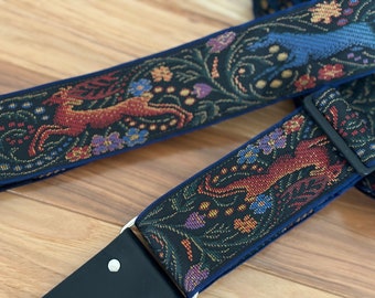Stag and Wolf Guitar Strap: Medieval Tapestry, Acoustic, Bass on black webbing, black leather tips, 3 sizes, 2” wide. Ukulele strap