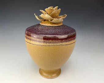 Porcelain cremation urn in honey luster and copper red