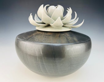 Porcelain cremation urn in black and white lotus
