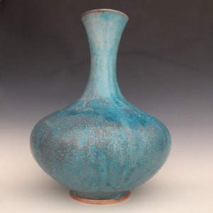 Cremation urn and vase in turquoise