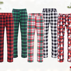 May include: Five pairs of pajama pants in various festive patterns. Designs include red and black buffalo check, green plaid, red and green plaid, black and white checkered, and red plaid with white deer and Christmas trees.