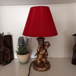 Vintage Brass And Rococo Style Ornate  Heavy Table Lamp With Cherub and Hollywood Regency Gilded Putti
