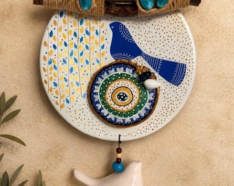 Adorno de pared de cerámica y madera con ojo turco, pájaro Nazar, estilo boho, arte de protección para el hogar.