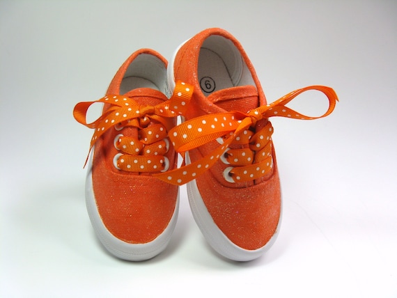 Orange glitter shop sneakers