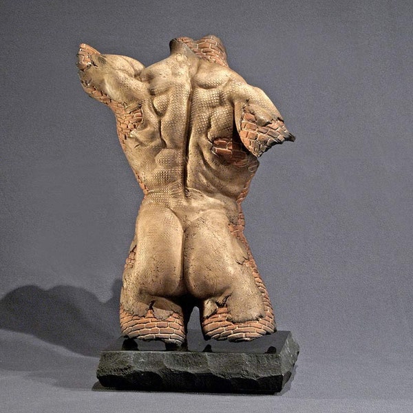 Architecture, nude brick male ceramic figure sculpture. Archers Back Fragment