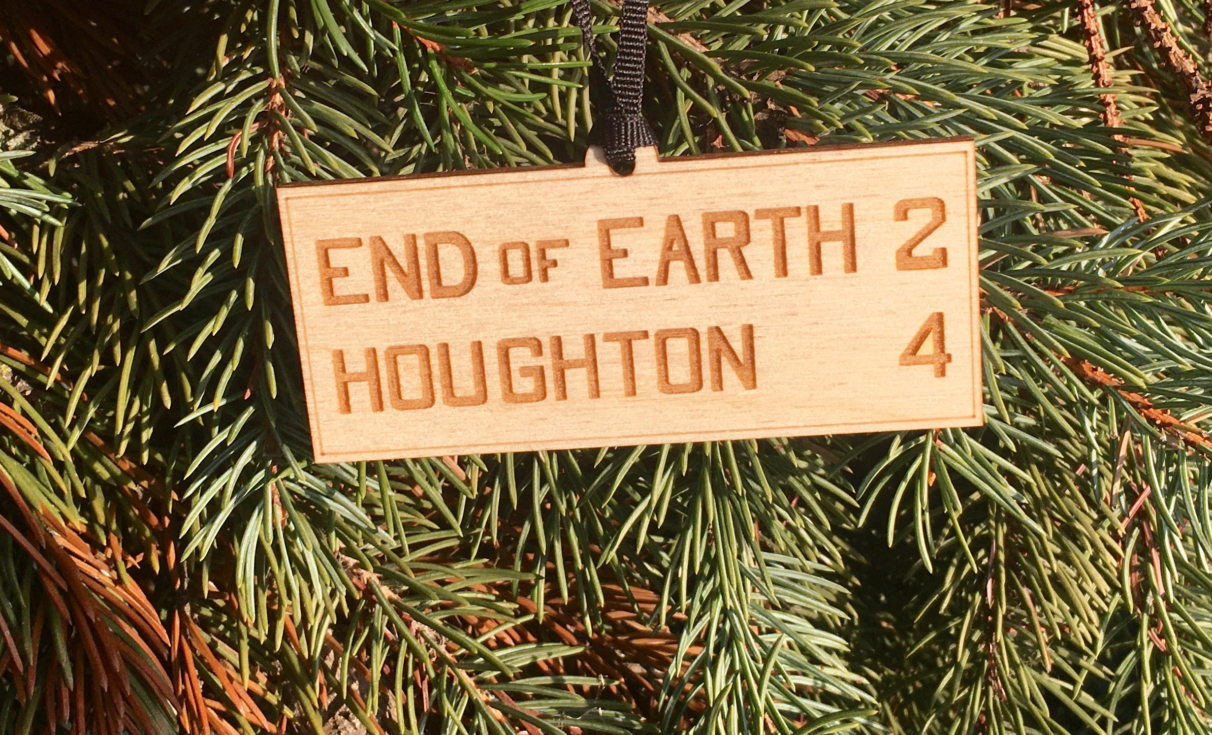 Michigan's Upper Peninsula "End of Earth" Road Sign Hou…