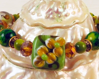 Green and Gold Lampwork Stretch Bracelet