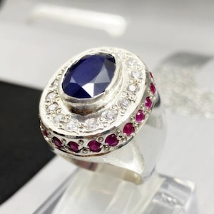 5 Carat Oval Blue Sapphire Ring: Sterling Silver, Ruby & Zircon Accents