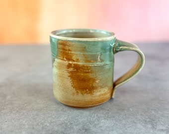 Soda fired mug with turqupoise glazed highlights// stoneware pottery mug 12 oz with textured flashing slip, handmade ceramic mug coffee tea