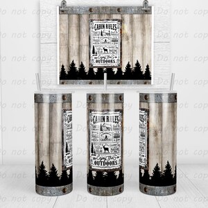 May include: A tumbler with a rustic wood grain design and metal accents. The tumbler features a label with the text "CABIN RULES" and outdoor-themed illustrations. A matching print is displayed in the background. The tumbler is approximately 20 cm tall.