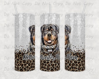 May include: A white tumbler with a glitter finish and a Rottweiler dog wearing glasses. The bottom of the tumbler has a leopard print design and the text "Rottweiler Mom".