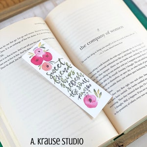May include: A watercolor bookmark with the text "Sweet friendships refresh the soul Proverbs 27:9" in green script. The bookmark features pink and red floral accents and the words "A. Krause Studio" at the bottom.