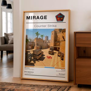 May include: A framed poster featuring the "Mirage" map from Counter-Strike. The image shows a desert-like environment with buildings, crates, and palm trees. The poster includes the game's title, map name, and developer information.