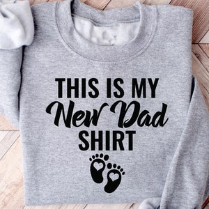 This Is My New Dad Sweatshirt, Father’s Day Shirt, Pregnancy Reveal Dad T-Shirt, Tee for Husband, Dad First Time Sweater, Gift for New Dad