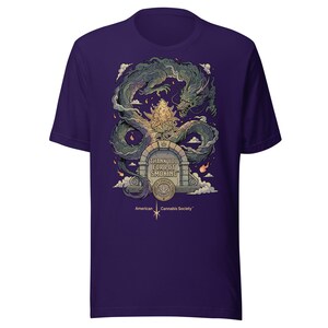 May include: A dark purple t-shirt featuring a graphic illustration of a green dragon encircling a cannabis bud above a stone archway. The text reads THANK YOU FOR POT SMOKING and American Cannabis Society with a small star icon below the text.