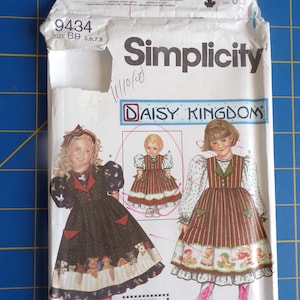 Simplicity Sewing Pattern 9434 Daisy Kingdom girls dress size 5,6,7,8, with doll dress pattern