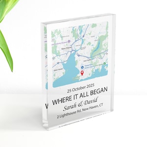 May include: A clear acrylic block displaying a map of New Haven, CT, with the inscription "WHERE IT ALL BEGAN" and the date "25 October 2025." The names "Sarah & David" and an address are also printed on the block.