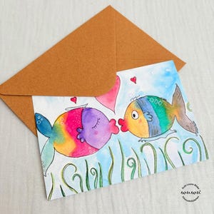 Tarjeta de felicitación con mensaje de amor y amistad con peces y sobre para el día de San Valentín