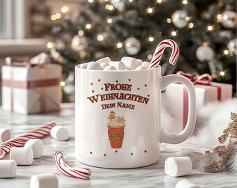 May include: White ceramic mug filled with marshmallows and a candy cane. The mug has the text "Frohe Weihnachten Dein Name" in red and green, along with a gingerbread latte design. Christmas-themed.