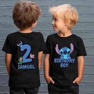 May include: Two black t-shirts with a blue Stitch character from Lilo & Stitch. One shirt says "Birthday Boy" and the other says "2 Samuel".