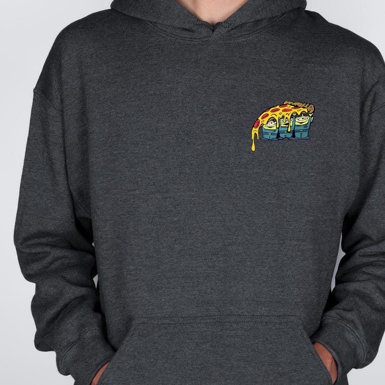 May include: Dark gray hoodie with a front pocket and a drawstring hood. The hoodie features a small, colorful graphic of pizza with three cartoon characters on the upper left chest. The pizza has yellow cheese and red pepperoni.