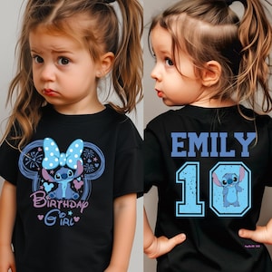 May include: Black t-shirt featuring a cartoon character with a blue bow and the text "Birthday Girl". The back of the shirt has the name "EMILY" and the number "10" in blue.