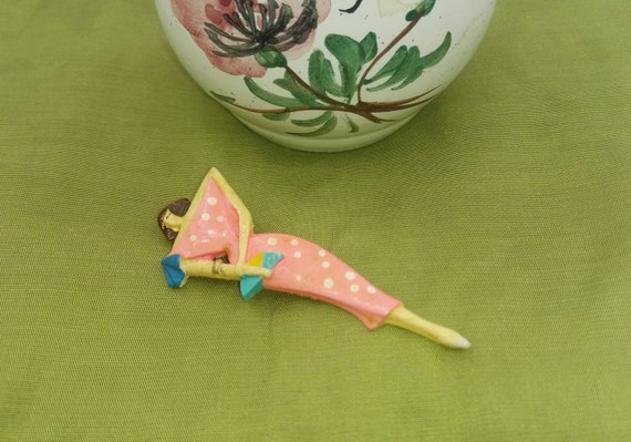 Vintage plastic fancy lady brooch signed