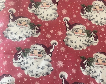 Joann fabrics vintage Santa head on red fabric, 100% cotton sold by the yard.