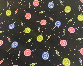Robert Kaufman Sweet Stuff black with blue, pink, purple, yellow and green lollipops