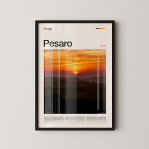 May include: Framed art print featuring a vibrant sunset over a mountain range. The word "Pesaro" is displayed in large, bold letters, with "Italy" below. The artwork has a black frame and a white border.